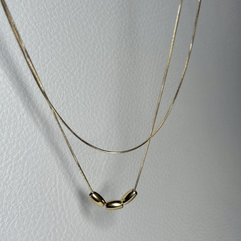 Gold double-layer necklace with three metal beads - Image 2